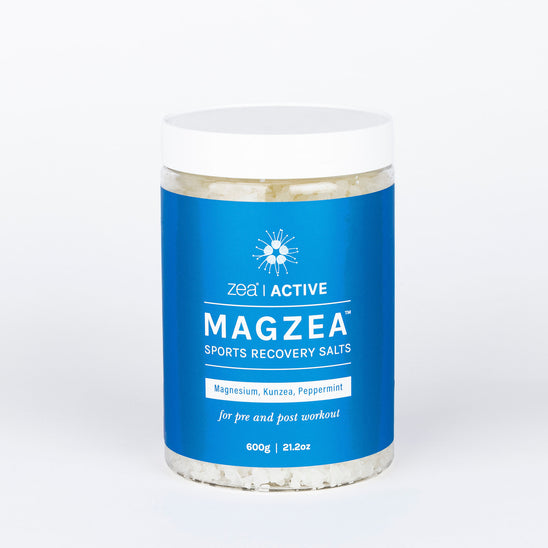 Container of Magzea Sports Recovery Salts with blue label on a white background